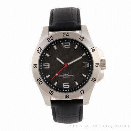 Metal watch with leather band at fashion design
